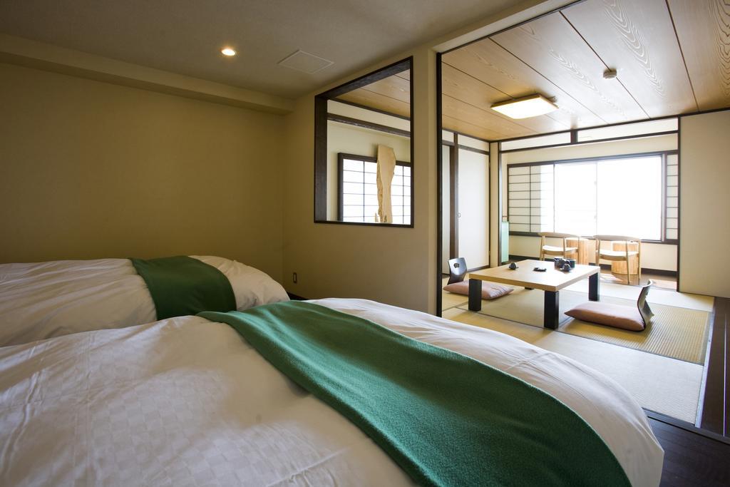 Hôtel The Beach Kurotake à Tokoname Extérieur photo